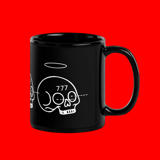 A glossy black ceramic mug with a white line art graphic of a skull, a halo, and the number '777' on a plain white background.